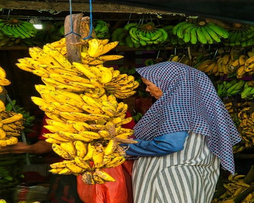 Fresh bananas and salak fruit displayed in an Indonesian traditional market